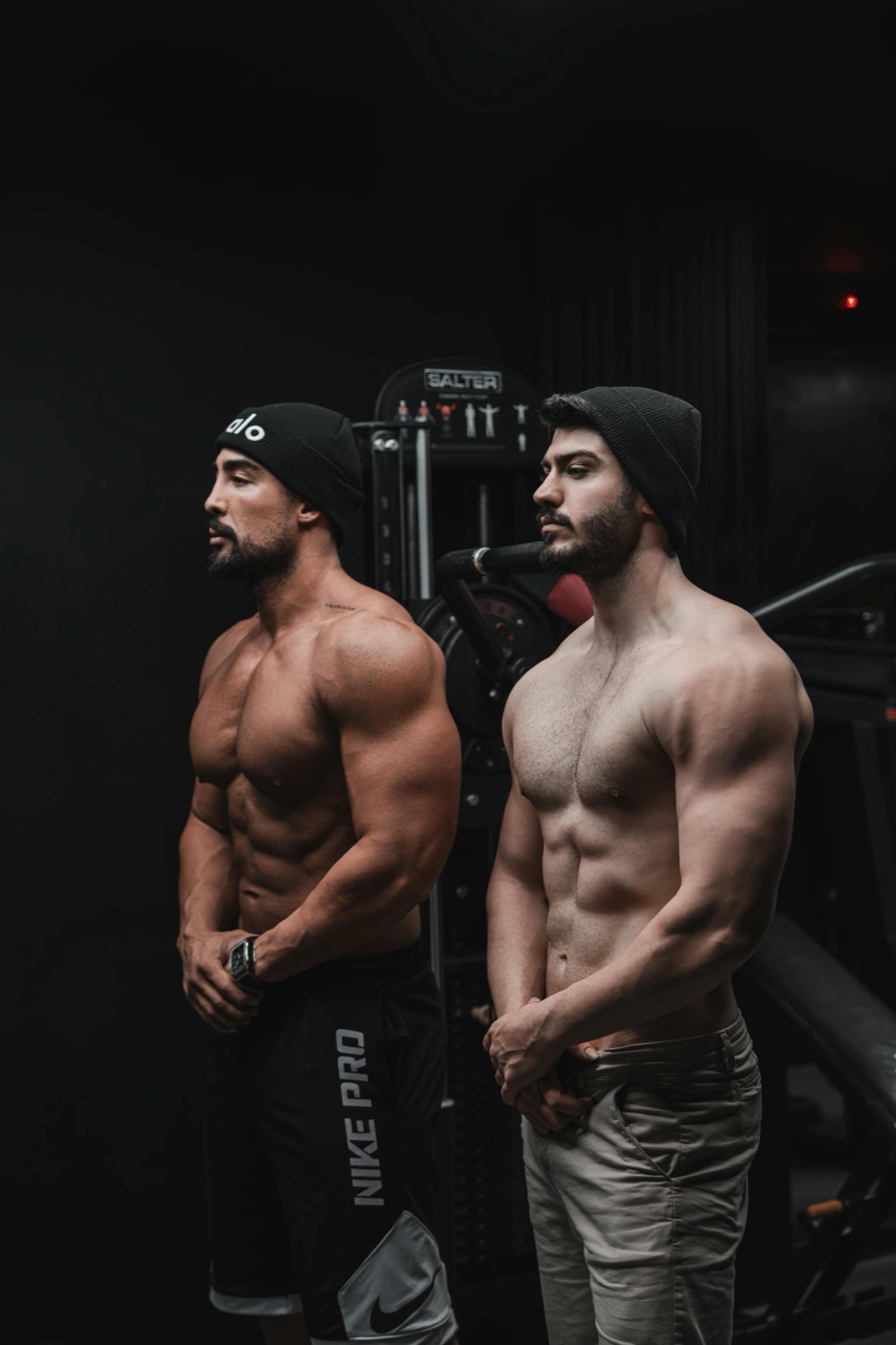 Two lean, transformed men training